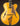 Blonde archtop guitar on a dark background