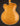 Back view of an archtop guitar against a dark background