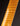 Close-up of a guitar neck with a dark background