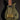 Black and gold electric guitar on a dark background