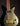 Black and gold electric guitar on a dark background