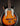 Vintage bass guitar with a sunburst finish on a dark background