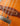 Close up of bridge and tailpiece on a bass guitar