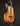 bass guitar with a sunburst finish on a dark background