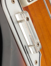 Close up of thumb rest on an electric bass guitar