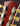 Close-up of a guitar's headstock with tuning pegs and serial number