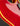 Close-up of a red guitar with yellowed binding