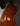 Back view of an electric guitar on a dark background