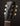 Gibson Les Paul guitar headstock on a dark background