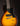 Electric guitar with a sunburst finish on a dark background