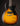 Electric guitar with a sunburst finish on a black background