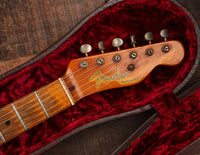 Fender Telecaster guitar headstock in case