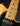 Close-up of a guitar neck with frets and strings on a black background