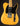 Electric guitar with a blonde finish on a dark background
