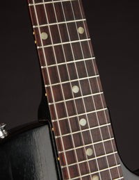 Close-up of a guitar neck 