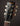 Gibson Les Paul guitar headstock with brand name on a dark background