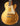 Gold electric guitar on a black background