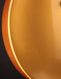 Close up of finish crack on a Gibson electric guitar
