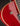 Close-up of a red electric guitar with a focus on the body and neck.