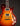 Close-up of a sunburst electric guitar on a dark background