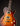 Electric guitar with a sunburst finish on a black background
