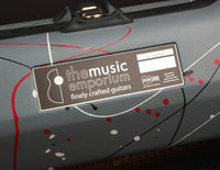 Close up of badge on a hardshell guitar case
