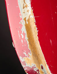 Close up of finish wear on a 1964 candy apple red Fender Stratocaster 