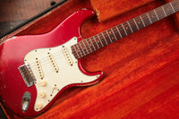 Fender Stratocaster guitar in original case with orange lining