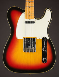 Sunburst Telecaster Custom electric guitar  on a dark background