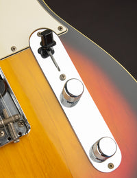 Close-up of a 1968 Telecaster Custom control panel with sunburst finish 