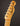 Close-up of a 1968 Fender Telecaster Custom guitar headstock on a dark background