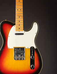 Sunburst Telecaster Custom electric guitar  on a dark background