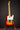 Close-up of a Sunburst 1968 Fender Telecaster Custom guitar headstock on a dark background 