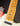 Close-up of a Telecaster guitar neck and body with a dark background