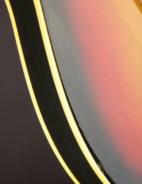 Close up of white binding on a sunburst Telecaster Custom 