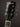 Gibson guitar headstock with brand name on a dark background
