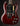 Red electric guitar with a black background