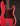 Red electric bass guitar with a red body on a black background