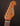 Guitar headstock with Grosh logo on a dark background
