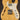 Wooden electric guitar with a pearl inlay on a dark background