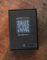 Bottom view of black guitar effects pedal