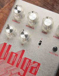 Guitar effects pedal with control knobs close up