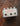 Guitar effects pedal with 'Heather Brown Electronics' branding on a wooden surface