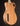 Wooden guitar body with a dark brown background