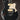 Black electric guitar on a dark background