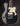 Black electric guitar on a dark background