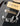 Close-up of a guitar's bridge and tailpiece