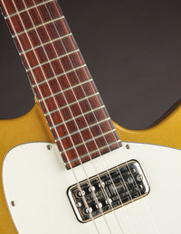Close-up of a guitar's fretboard