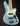 Light blue electric bass guitar with a dark background
