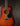 Martin acoustic guitar with a sunburst finish on a dark background